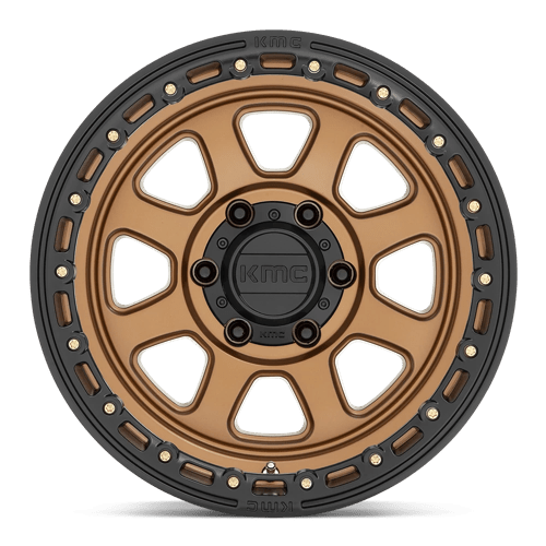 KMC KM548 CHASE Matte Bronze W/ Black Lip wheel designed for trucks, Jeeps, and SUVs with bold aesthetics.