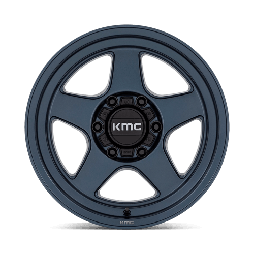 KMC KM728 LOBO Metallic Blue wheel showcasing rugged design and durability for off-road vehicles.