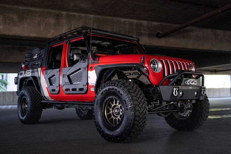 Rugged Off Road Exterior Accessories enhancing the appearance of a modified Jeep in a parking garage.