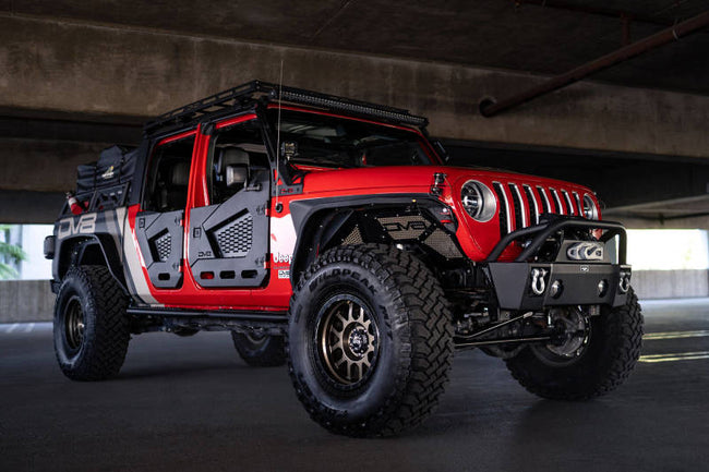 Rugged Off Road Exterior Accessories enhancing the appearance of a modified Jeep in a parking garage.