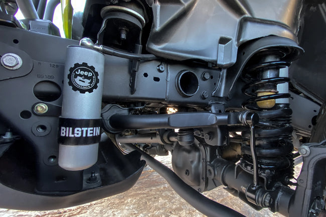 Close-up of Premium Off Road Suspension Parts featuring Bilstein shock absorber in a Jeep