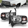 Anzo USA | Crystal Headlight Set Clear Lens Black Housing w/LED Accent Pair | Fits Ram 1500 | 111205
