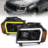 Anzo USA | Projector Headlight Set Black Housing w/Light Bar Switchback | Fits Grand Cherokee | 111543