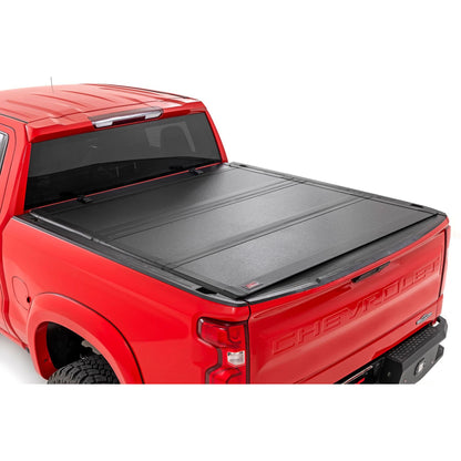 ROUGH COUNTRY Hard Tri-Fold Flip Up Bed Cover | 6'7" Bed | Chevy/GMC Sierra 1500 (19-26)/Silverado 1500 (19-26)  | 49120650