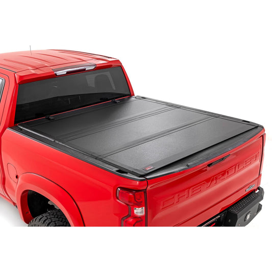 ROUGH COUNTRY Hard Tri-Fold Flip Up Bed Cover | 6'7" Bed | Chevy/GMC Sierra 1500 (19-26)/Silverado 1500 (19-26)  | 49120650