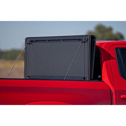ROUGH COUNTRY Hard Tri-Fold Flip Up Bed Cover | 6'7" Bed | Chevy/GMC Sierra 1500 (19-26)/Silverado 1500 (19-26)  | 49120650