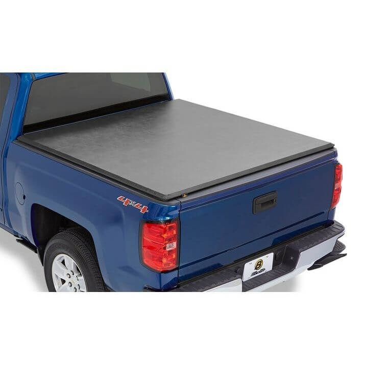 BESTOP | EZ-Roll Soft Tonneau Cover For Nissan 2005-2024 Frontier 5.0 Foot Black Tailgate Spoiler Not Included Bestop | 19146-01 on blue truck.