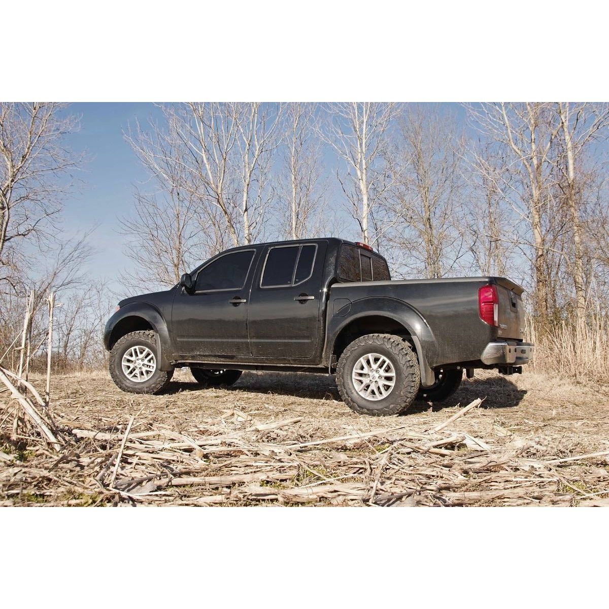 ROUGH COUNTRY 2.5 Inch Leveling Kit | Red Spacers | Nissan Frontier (05-25)/Xterra (05-15)  | 865RED