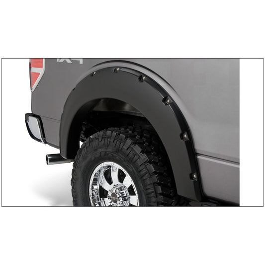 Husky Liners | Pocket Style Fender Flare 4 PC Set For 2009-2014 F-150 Husky Liners | 2802929 on a truck with oversized tires.