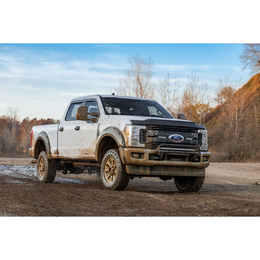 Husky Liners | Pocket Style Fender Flare 4 PC Set For 2017-2022 F-250/F-350 Super Duty Husky Liners | 2802942 on a rugged truck.