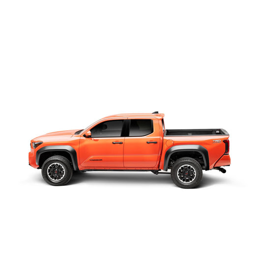 Husky Liners | Extend-A-Fender 4 PC Fender Flare Set For 2024-2026 Tacoma Husky Liners | 2803931 installed on orange Tacoma