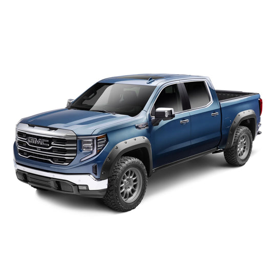 Husky Liners | Pocket Style Fender Flare 4 PC Set For 2019-2026 Sierra 1500 Husky Liners | 2804909 installed on a blue GMC truck.