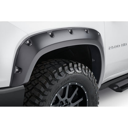 Husky Liners | Extend-A-Fender 4 PC Fender Flare Set For 2020-2026 Sierra 2500 HD/3500 HD Husky Liners | 2804988 mounted on a truck.