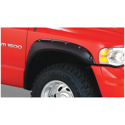 Husky Liners | Pocket Style Fender Flare 4 PC Set For 2006-2009 Ram 1500/2500/3500 Husky Liners | 2805911 on a red truck