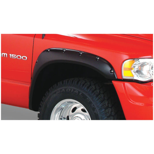 Husky Liners | Pocket Style Fender Flare 4 PC Set For 2006-2009 Ram 1500/2500/3500 Husky Liners | 2805911 on a red truck