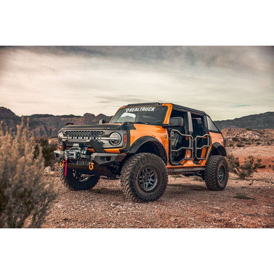 Husky Liners | Aeroskin II Hood Protector Matte Black Low Profile For 2021-2026 Bronco Husky Liners | 2830183 on an orange Bronco.