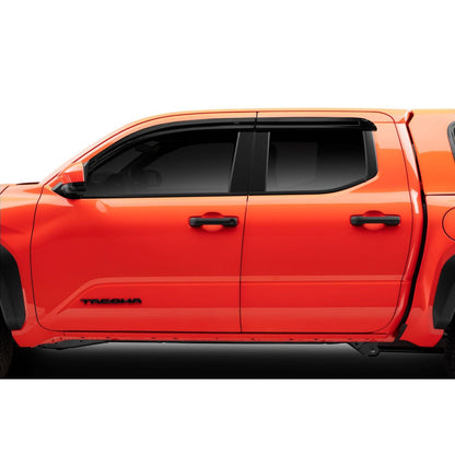 Husky Liners | Low Profile Ventvisor Deflector Smoke 4 pc. Husky Liners | 2854135 installed on an orange truck