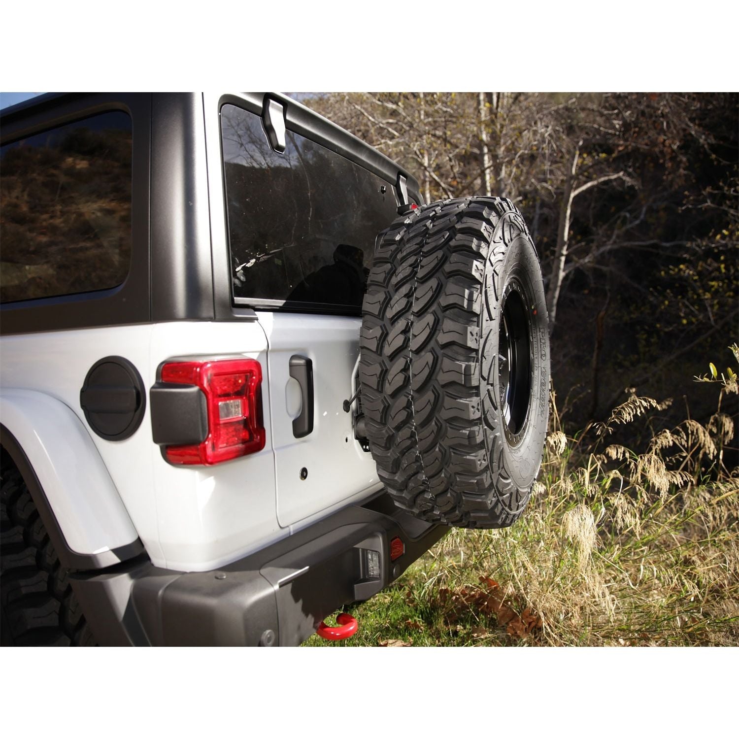 SMITTYBILT | JL Tire Relocation Bracket 2018-Up Jeep Wrangler JL Smittybilt |7721 installed with a 37-inch spare tire.