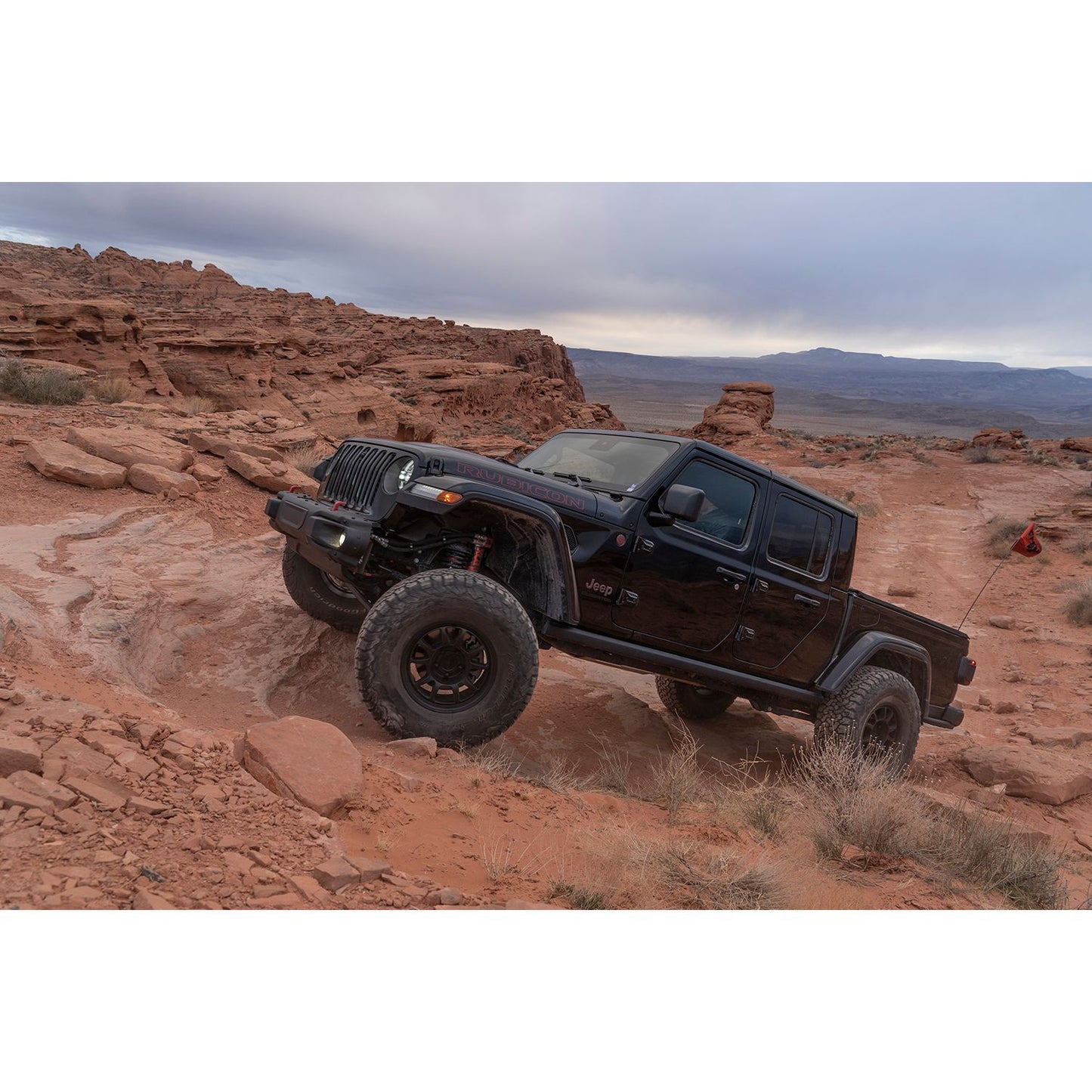 FOX | 18-On Jeep Wrangler JL & 20-On Jeep Gladiator Front Gen2 Bump Stop 2.0 Series IFP 2.00 Inch Travel 10.00 Inch Ext Kit | 883-02-167 on rugged terrain.