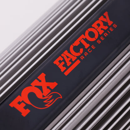 FOX | Shock Absorber 21.5-On Ford Raptor Front Coilover Live Valve Internal Bypass3.0 Series Remote Reservoir 35 Inch/37 Inch Tire 0-1 Inch/0-.5 Inch Lift Kit | 883-06-182 logo on a coilover reservoir.