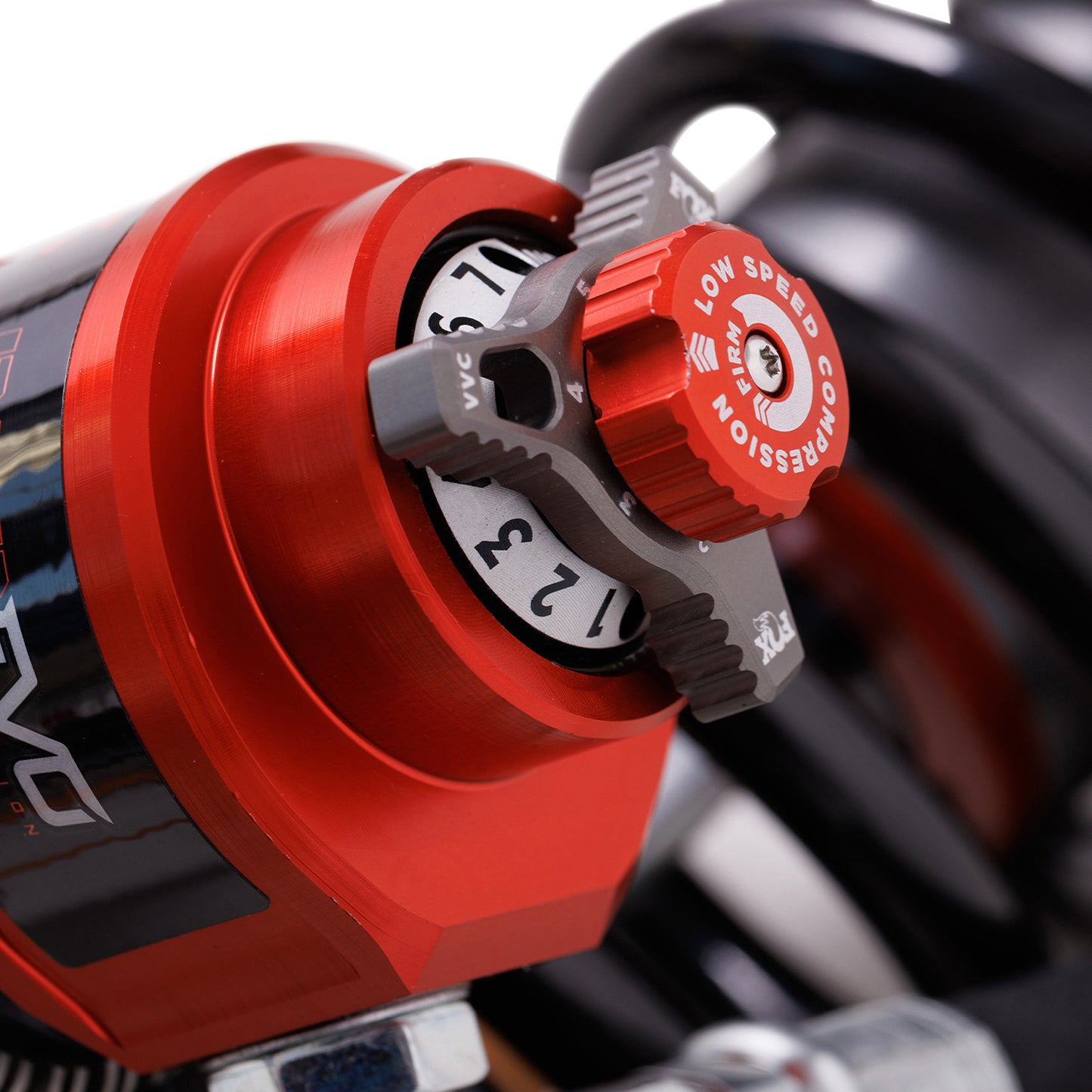 FOX | Shock Absorber 24-On Toyota Tacoma Front Coilover Internal Bypass 3.0 Series Remote Reservoir Dual Speed Compression Evo 2-3 Lift Kit | 883-06-232 close-up of adjustment knob.