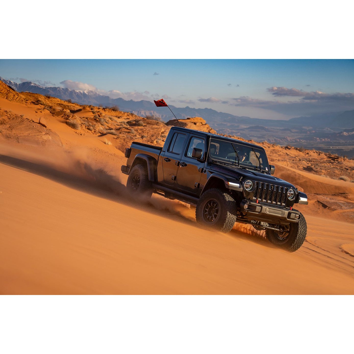 FOX | Shock Absorber 18-On Jeep Wrangler JL Front 2.5 Truck Performance Elite Series Remote Reservoir 3.5-4 Inch Lift Dual Speed Compression Kit | 883-26-051 in action on sand dunes.