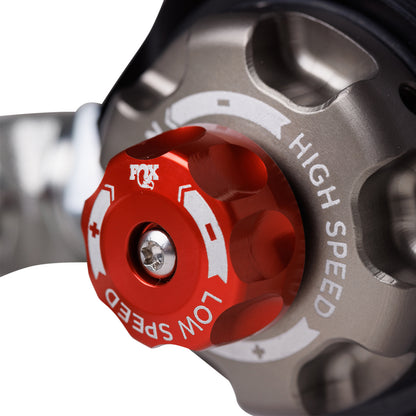 FOX | Shock Absorber 07-18 Jeep Wrangler JK Front Internal Bypass 2.5 Factory Race Series Remote Reservoir 2.5-4 Inch Lift Dual Speed Compression Kit | 883-26-109 adjustment knobs close-up