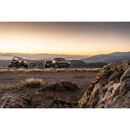 FOX | Shock Absorber 20-On Gm 2500/3500 HD Front Performance Series 2.0 IFP 4.9 Inch 0-1 Inch Lift | 985-24-238 truck and off-road vehicle in sunset mountain scenery.