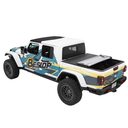 BESTOP | EZ-Fold Soft Tonneau '20-26 Gladiator For 5 ft. bed Black Diamond Bestop | 16280-35 on a truck bed.