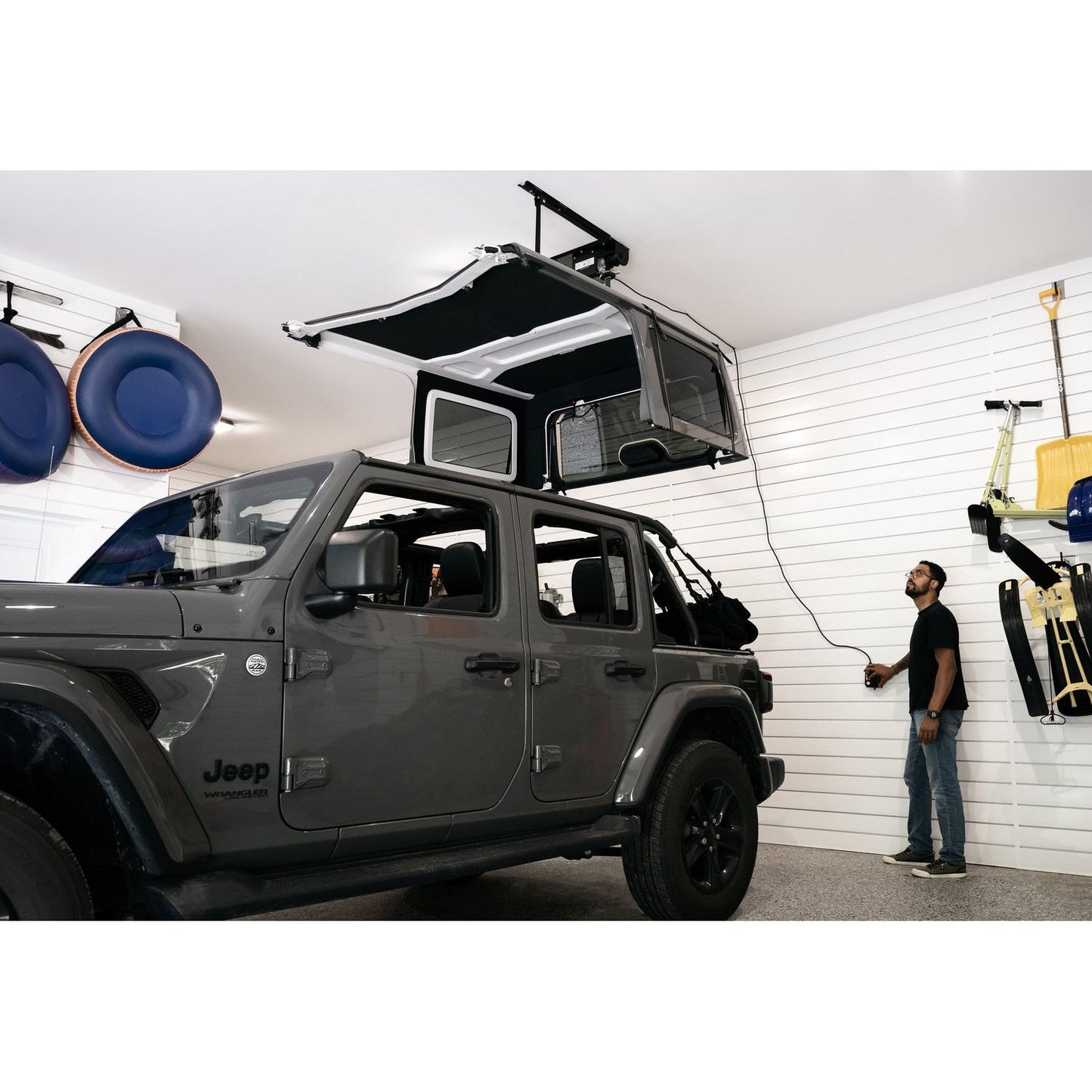BESTOP | HOSS Hardtop Hoist Jeep 2018-26 Wrangler JL Black Bestop | 42820-01 in use with Jeep, showcasing easy hardtop removal.