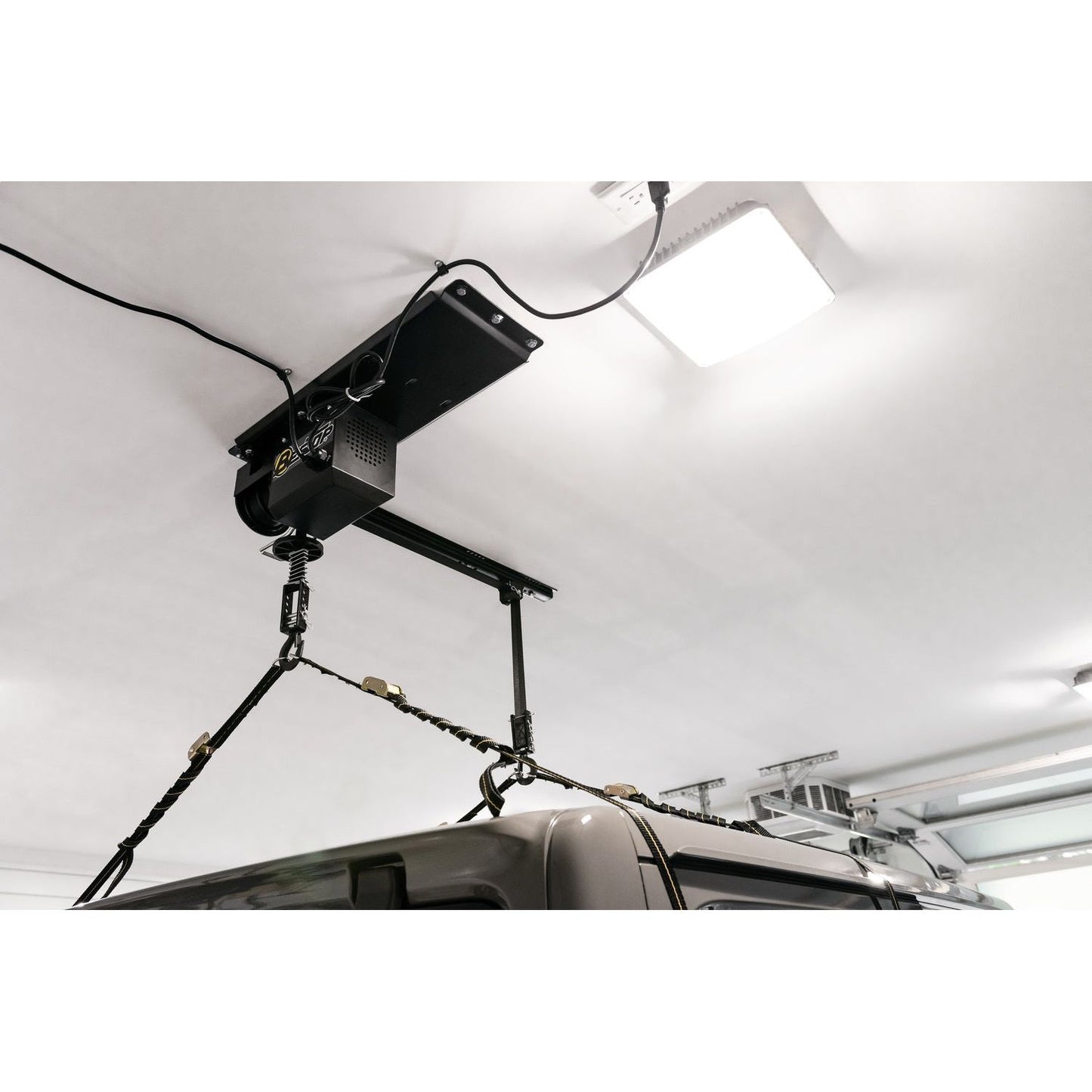 BESTOP | HOSS Hardtop Hoist Jeep 2018-26 Wrangler JL Black Bestop | 42820-01 installed in garage for efficient hardtop removal.