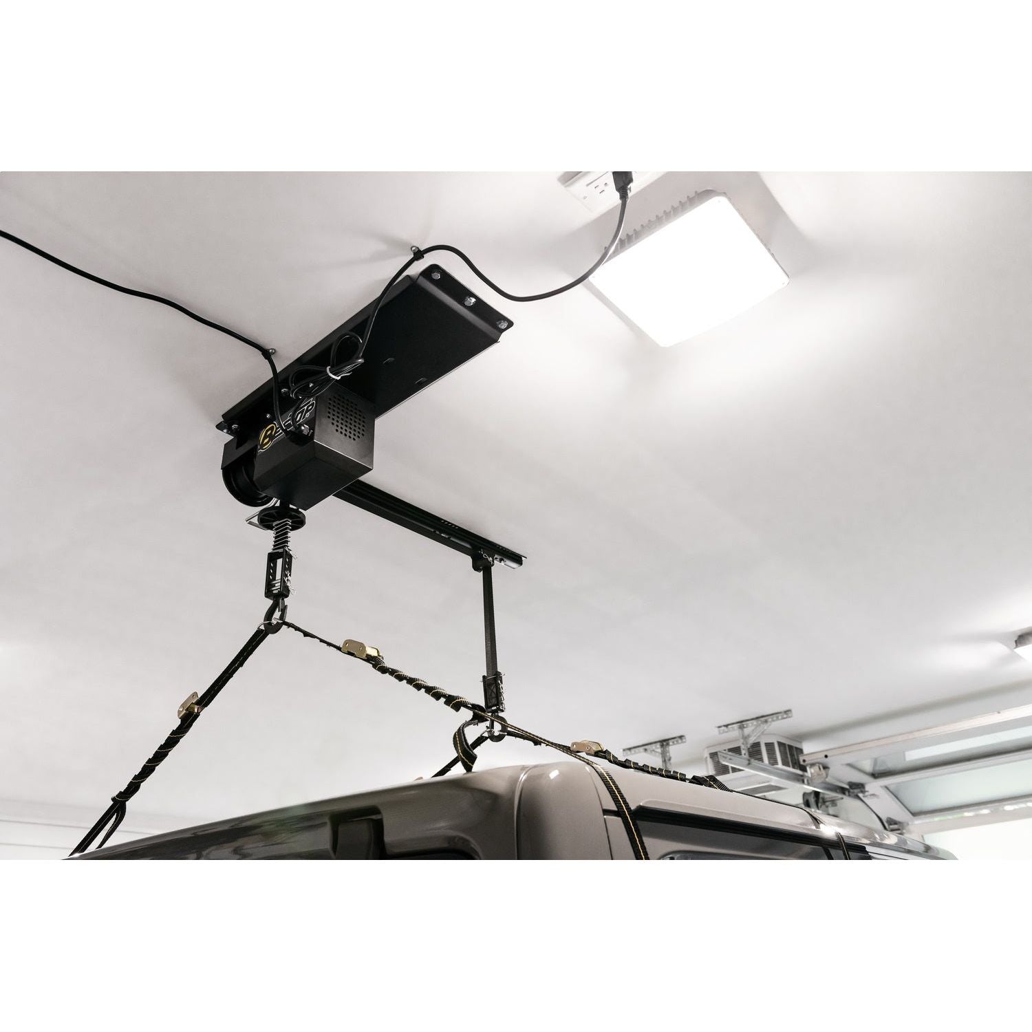 BESTOP | HOSS Hardtop Hoist Jeep 2018-26 Wrangler JL Black Bestop | 42820-01 installed in garage for efficient hardtop removal.