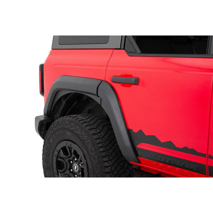 Bestop Bestop Fender Flares Black I 49701-01 installed on a red Ford Bronco, enhancing its retro-modern style.