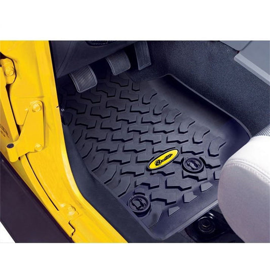 BESTOP | Jeep Wrangler Front Floor Mats For Jeep 2014-2018 Wrangler JK Black Pair Bestop | 51513-01 installed in a yellow Jeep interior.