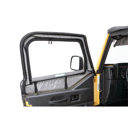 BESTOP | Jeep Fabric Door Skins For Jeep 1997-2006 Wrangler TJ Black Denim Pair Bestop | 53121-15 installed on a Jeep door.