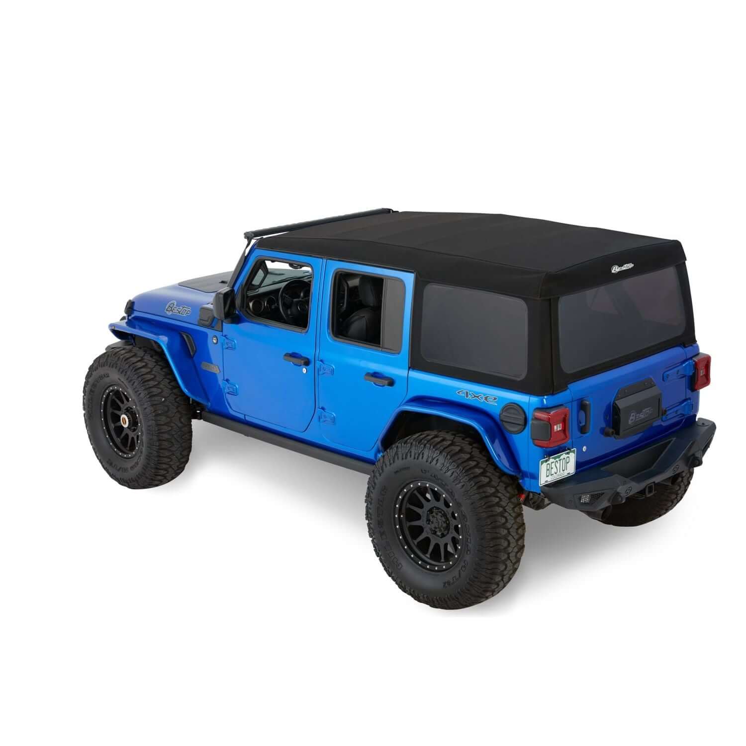 BESTOP | Supertop Jeep '18-26 Wrangler JL 4-Door Premium Black Twill Bestop | 54726-17 on a blue Jeep Wrangler.