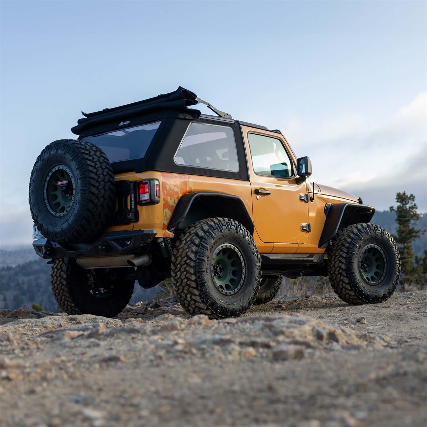 BESTOP | Trektop Glide 2-Door for JL Jeep 2018-26 Wrangler JL Premium Black Twill Bestop | 54930-17 on a modified Wrangler Jeep.