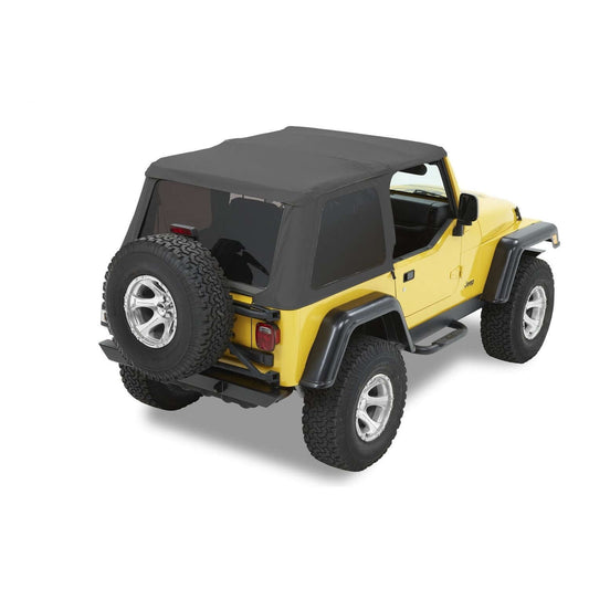 BESTOP | Trektop Slantback Soft Top For Jeep 1997-2006 Wrangler TJ Black Denim Bestop | 56820-15 on a yellow Jeep