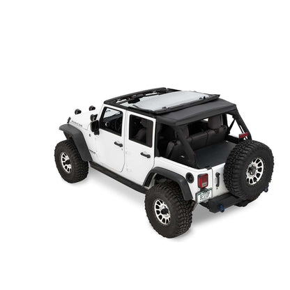 BESTOP | The Ascent Soft Tops For Jeep 2007-2018 Wrangler JK 4 Door Black Diamond Bestop | 56825-35 on a white Jeep Wrangler.