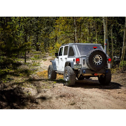 BESTOP | The Ascent Soft Tops For Jeep 2007-2018 Wrangler JK 4 Door Black Diamond Bestop | 56825-35 on a Jeep in forest