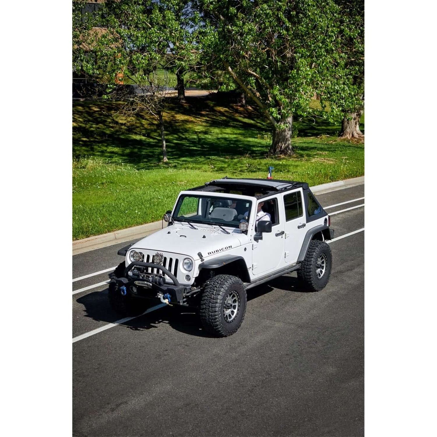 BESTOP | The Ascent Soft Tops For Jeep 2007-2018 Wrangler JK 4 Door Black Diamond Bestop | 56825-35 on a white Jeep.