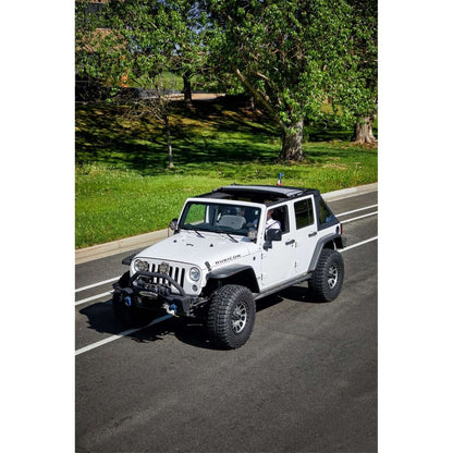 BESTOP | The Ascent Soft Tops For Jeep 2007-2018 Wrangler JK 4 Door Black Diamond Bestop | 56825-35 on a white Jeep.