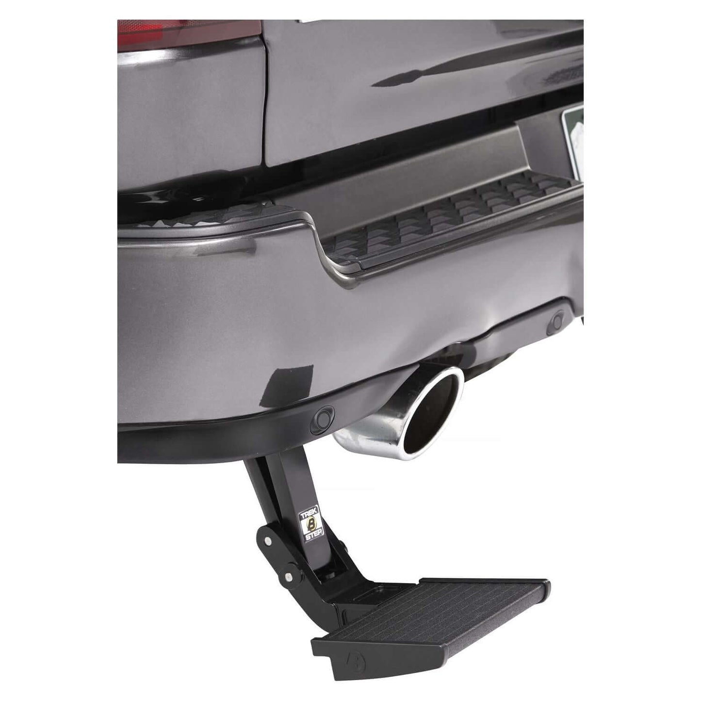 TrekStep Rear Mount Step Black Driver Side I 75519-15 installed on a RAM 1500 rear bumper for easy access.