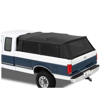 BESTOP | Supertop Truck Bed Cap For Dodge 2002-2008 Ram 1500/2500 6.5 Foot Bed Black Diamond Fabric Bestop | 76304-35 mounted on truck.