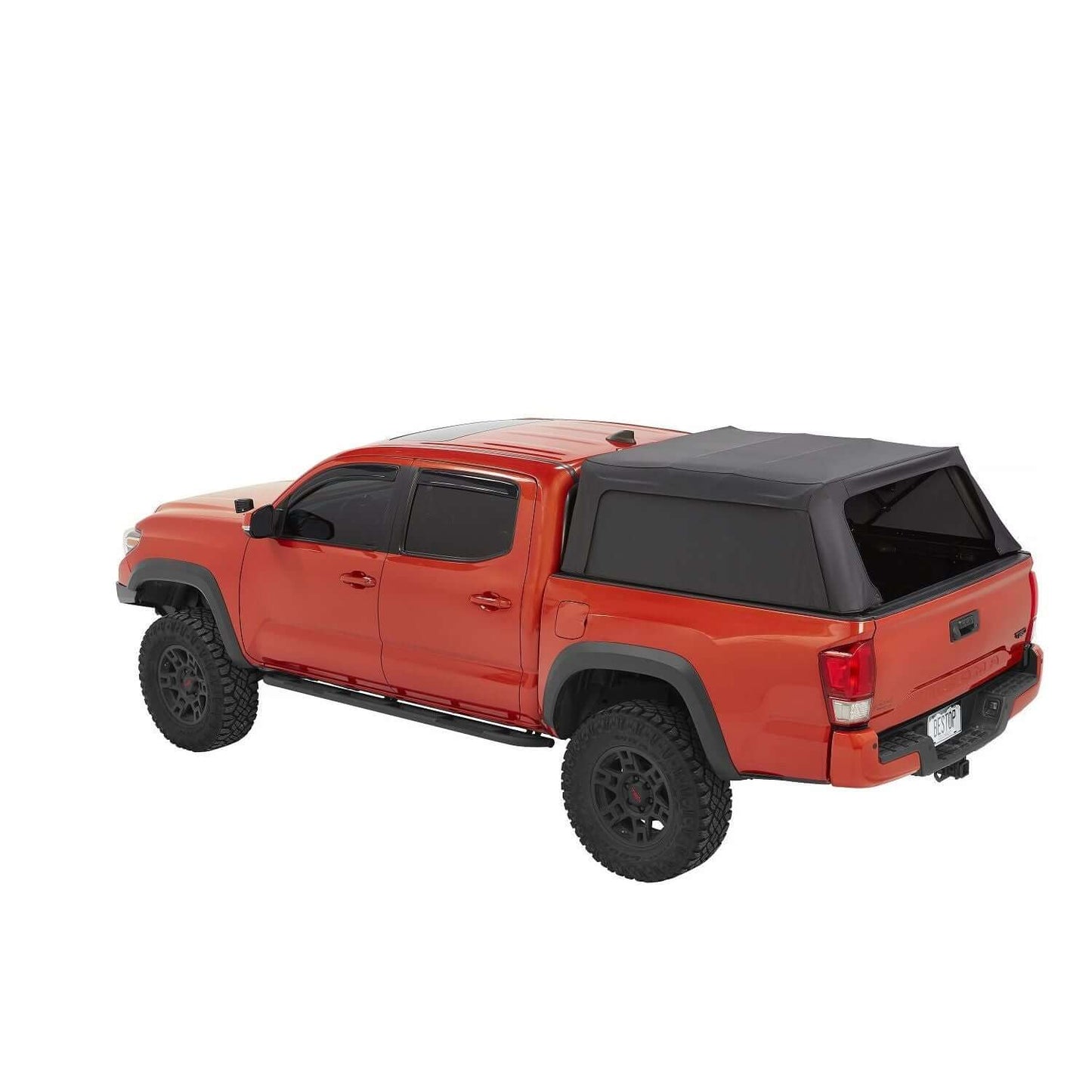 BESTOP | Supertop Truck Bed Cap 2 For Toyota 2016-2023 Tacoma 6.0 Foot Black Diamond PVC Coated Sailcloth No Drill Bestop | 77301-35 installed on an orange Toyota Tacoma.