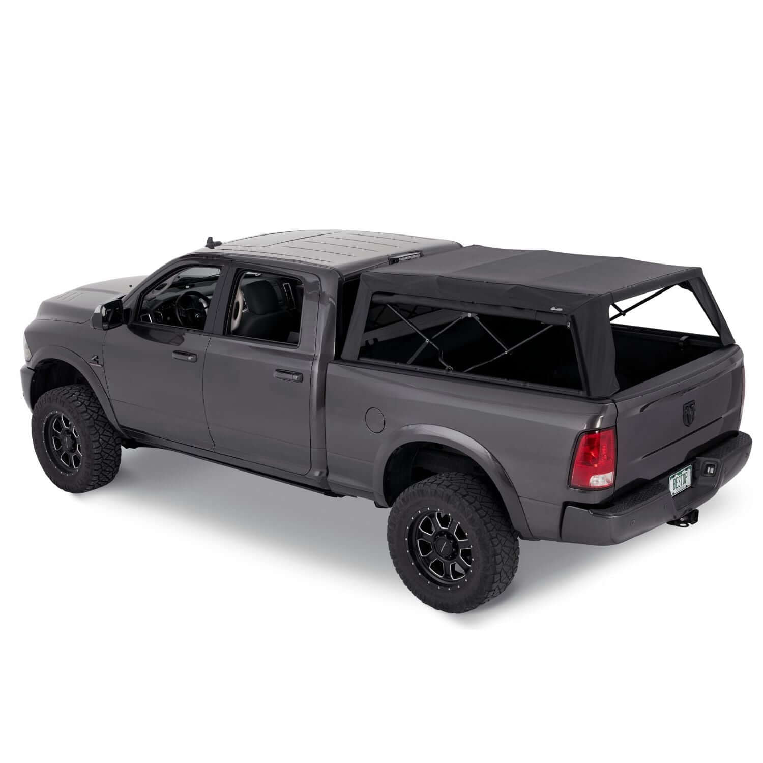 BESTOP | Supertop Truck Bed Cap 2 For Dodge 2009-10 Ram 1500 6.5 Foot Black Diamond PVC Coated Sailcloth No Drill Bestop | 77328-35 on a gray pickup truck.