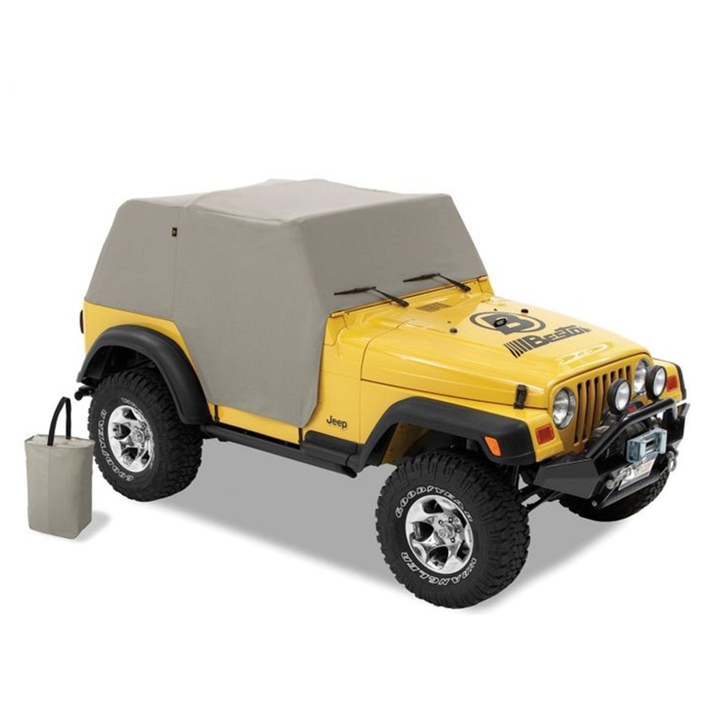 BESTOP | All Weather Jeep Trail Cover For Jeep 1997-2006 Wrangler TJ Charcoal/Gray Bestop | 81037-09 on a yellow Jeep.