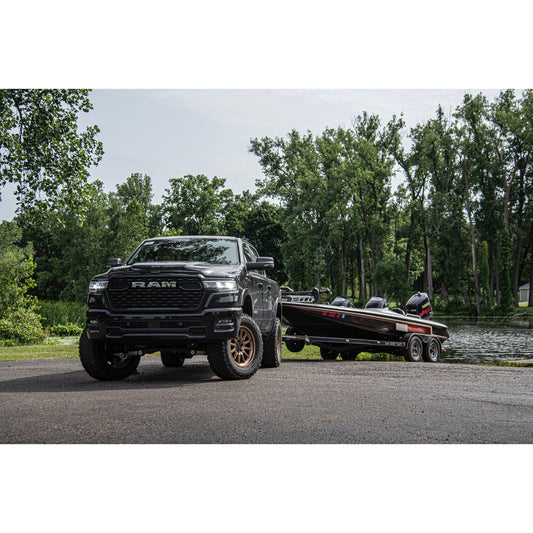 BDS Suspension lift kit on 2025-2026 RAM 1500 Rebel with boat in background.