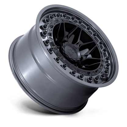 Black Rhino ALPHA Matte Black W/ Gunmetal Lip wheel showcasing a motorsports-inspired design for off-road use.