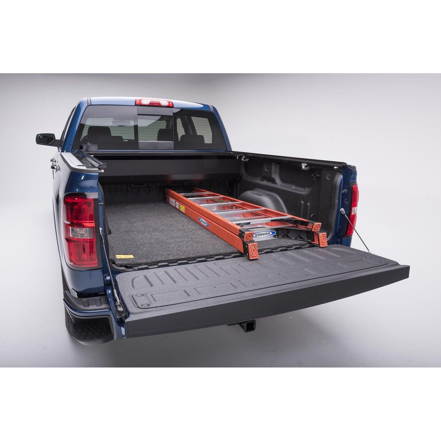 BedRug Bedmat For Spray-In Or No 07-18 - Charcoal (19 Legacy/Limited) Sivlerado/Sierra 6'6" Bed 3/4 Inch Thick w/Cargo Channel System Bed Mat in truck bed.